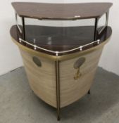 A VINTAGE 1960'S COCKTAIL BAR IN THE FORM OF A BOAT BOW.