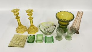 A SMALL GROUP OF URANIUM GLASS TO INCLUDE VASES AND A PAIR OF CANDLE STICKS ETC.