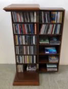 MODERN CD STORAGE CABINET CONTAINING LARGE QUANTITY MIXED CD'S.