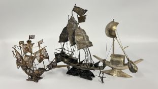 A GROUP OF THREE INTRICATE VINTAGE MODEL BOATS TO INCLUDE WHITE METAL AND FILIGREE EXAMPLES.