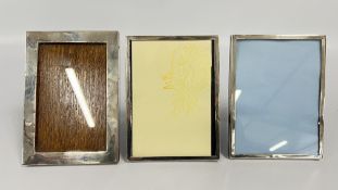 THREE SILVER PHOTOGRAPH FRAMES, THE LARGEST 19 X 13.5CM.