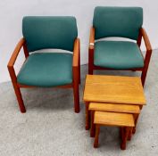 TWO MODERN GREEN UPHOLSTERED ARM CHAIRS ALONG WITH A NEST OF 3 TABLES.