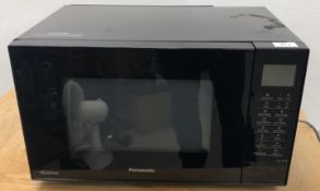 A PANASONIC INVERTER MICROWAVE, NN-CT56JB - SOLD AS SEEN.