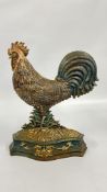 A REPRODUCTION CAST COCKERAL DOORSTOP.