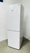 A BOSCH UPRIGHT FRIDGE FREEZER - SOLD AS SEEN.