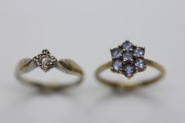 A 9CT GOLD TANZANITE CLUSTER RING AND A FURTHER 9CT WHITE / YELLOW GOLD DIAMOND SOLITAIRE RING.