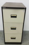 A MODERN STEEL THREE DRAWER FILING CABINET.