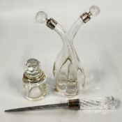 A VINTAGE CLEAR GLASS ENTWINED VINEGAR AND OIL DECANTER, SILVER RIMMED, BIRMINGHAM ASSAY,