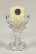 A MARQUIS WATERFORD CRYSTAL PILLAR CANDLE HOLDER AND CANDLE,