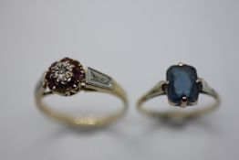 A 9CT GOLD DRESS RING + A 9CT GOLD DIAMOND AND RUBY TONE CLUSTER RING (STONE MISSING).