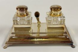 A SOLID SILVER DOUBLE INKWELL WITH A PAIR OF SILVER MOUNTED INKWELLS MARKED CRISTALLO GARANTITO BY