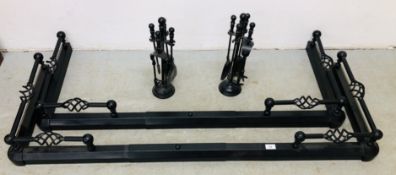 TWO ADJUSTABLE BLACK FINISH METAL FIRE HEARTH FENDER SURROUNDS + TWO SETS OF FIRE IRONS.