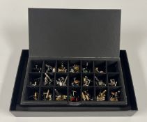 A MODERN CUFF LINK BOX AND CONTENTS TO INCLUDE AN EXTENSIVE GROUP OF MODERN AND DESIGNER CUFF LINKS.