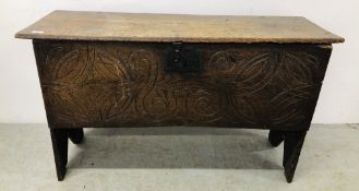 AN EARLY C18TH CARVED OAK SIX PLANK COFFER - WIDTH 110CM.