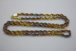 A 9CT TRI COLOUR GOLD ROPE NECKLACE, LENGTH 50CM.