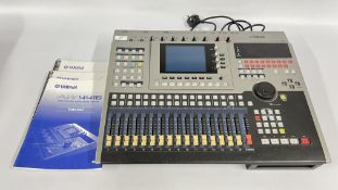 A YAMAHA AW4416 PROFESSIONAL AUDIO WORKSTATION WITH POWER CABLE + GUIDES - SOLD AS SEEN.