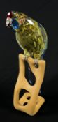 A SWAROVSKI CRYSTAL GREEN ROSELLA ORNAMENT A 9600 NR 00 085, IN ORIGINAL PRESENTATION BOX.