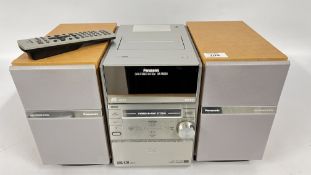 PANASONIC DVD STEREO SYSTEM SA-PM39D COMPLETE WITH 3 WAY SPEAKER SYSTEM AND REMOTE - SOLD AS SEEN.