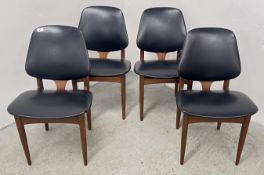 A SET OF FOUR MID CENTURY TEAK DINING CHAIRS BY ELLIOTTS OF NEWBURY WITH BLACK VINYL UPHOLSTERED