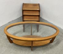 A NATHAN RETRO DESIGN OVAL GLASS TOP COFFEE TABLE AND A SET OF NATHAN STYLE TEAK GRADUATED