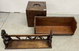 AN ANTIQUE OAK LOCKABLE TREASURY BOX WITH KEY, CARVED OAK BOOK RACK, PINE BOOK RACK.