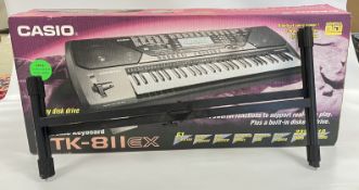 A CASIO ELECTRONIC KEYBOARD CTK-811 EX AND STAND IN ORIGINAL BOX - SOLD AS SEEN.