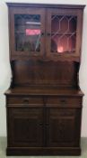 OAK FINISH TWO DRAWER TWO DOOR DRESSER WITH WITH TWO DOOR GLAZED UPSTAND, W 96 X D 45 X H 185CM.