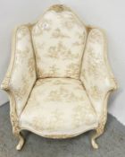 A CONTINENTAL CLASSIC DESIGN CREAM PAINTED ARM CHAIR WITH CLASSICAL SCENE UPHOLSTERY.