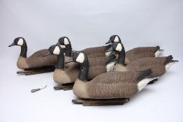 A GROUP OF 6 FULL BODIED DECOY GEESE AND 6 HALF BODIED DECOY GEESE