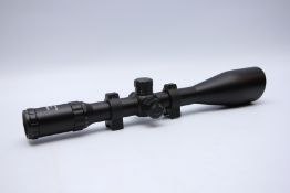 A NIKKO STIRLING NIGHTEATER 6-24X56 SCOPE WITH MOUNTS