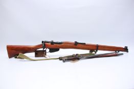 A DENIX REPLICA SMLE SHOT MAGAZINE LEE ENFIELD RIFLE WITH BAYONET & CANVAS SHOULDER STRAP - (NO