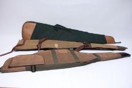 3 GOOD QUALITY GUN SLIPS TO INCLUDE JACK PYKE LEATHER EFFECT, GREEN CANVAS,