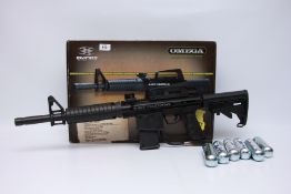OMEGA SEMI AUTOMATIC PAINTBALL MARKER RIFLE IN ORIGINAL BOX WITH INSTRUCTION DISC - (ALL GUNS TO BE