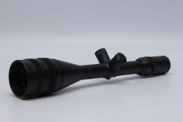 A BOXED MILLETT 4318 6-25X56 PRECISION LONG RANGE VARMINT TARGET SCOPE