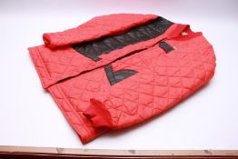 A WINCHESTER RED QUILTED SHOOTING JACKET SIZE 42.