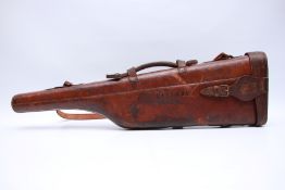 AN ANTIQUE LEATHER 