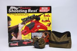 A BOXED NTN PREDATOR SHOOTING REST,