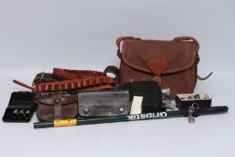 A GROUP OF SHOOTING ACCESSORIES TO INCLUDE CANVAS CARTRIDGE BAG, GRIPSTICK PICK UP, CARTRIDGE BELT,