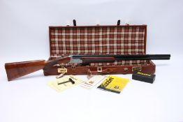 RIZZINI 16 BORE ROUND BODY EM OVER AND UNDER SHOTGUN, 30