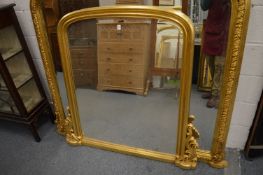 Victorian style plain gilt framed over mantel mirror.