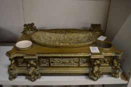 A good decorative cast brass table stand.