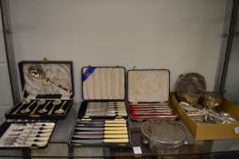 A quantity of cased flatware and other items.