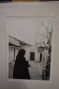 A pair of black and white photographic prints.