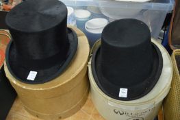 A top hat, internal size 19cm x 16cm together with another hat 19.5cm x 16cm.