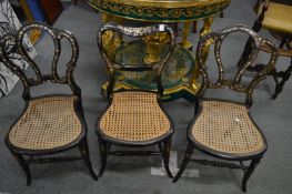 A pair of Victorian papier mache and mother of pearl inlaid occasional chairs and a similar chair.