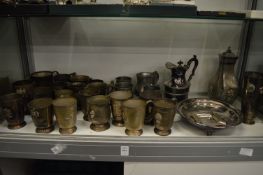 An Eastern white metal coffee pot, quantity of plated tankards and other items.