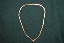 A 9ct gold necklace.