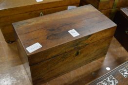 A 19th century rosewood tea caddy.