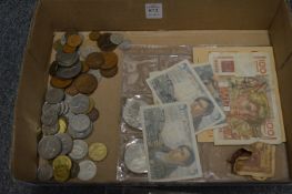 Various coins and bank notes.