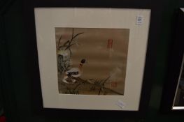 Chinese embroidered picture depicting two geese, framed and glazed.